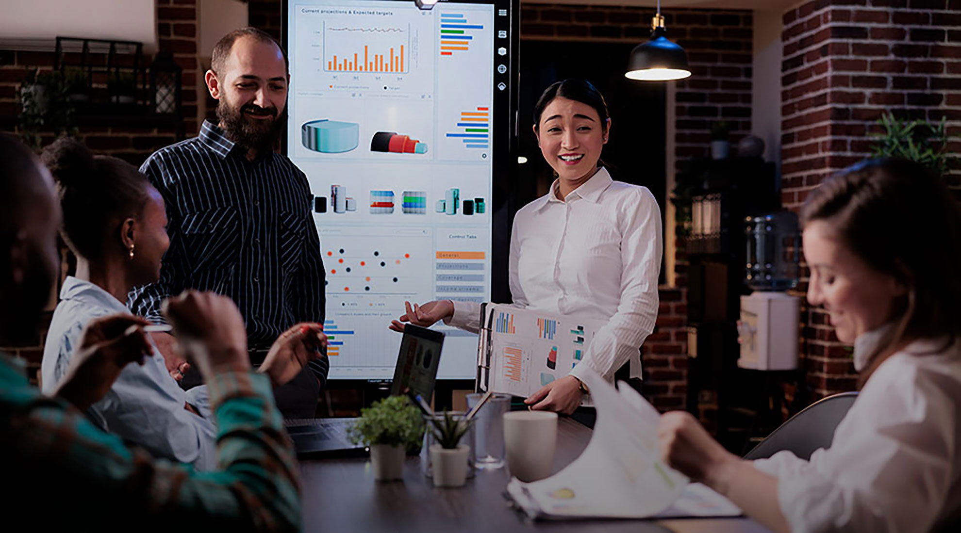 Team reviewing operational dashboards in a meeting room